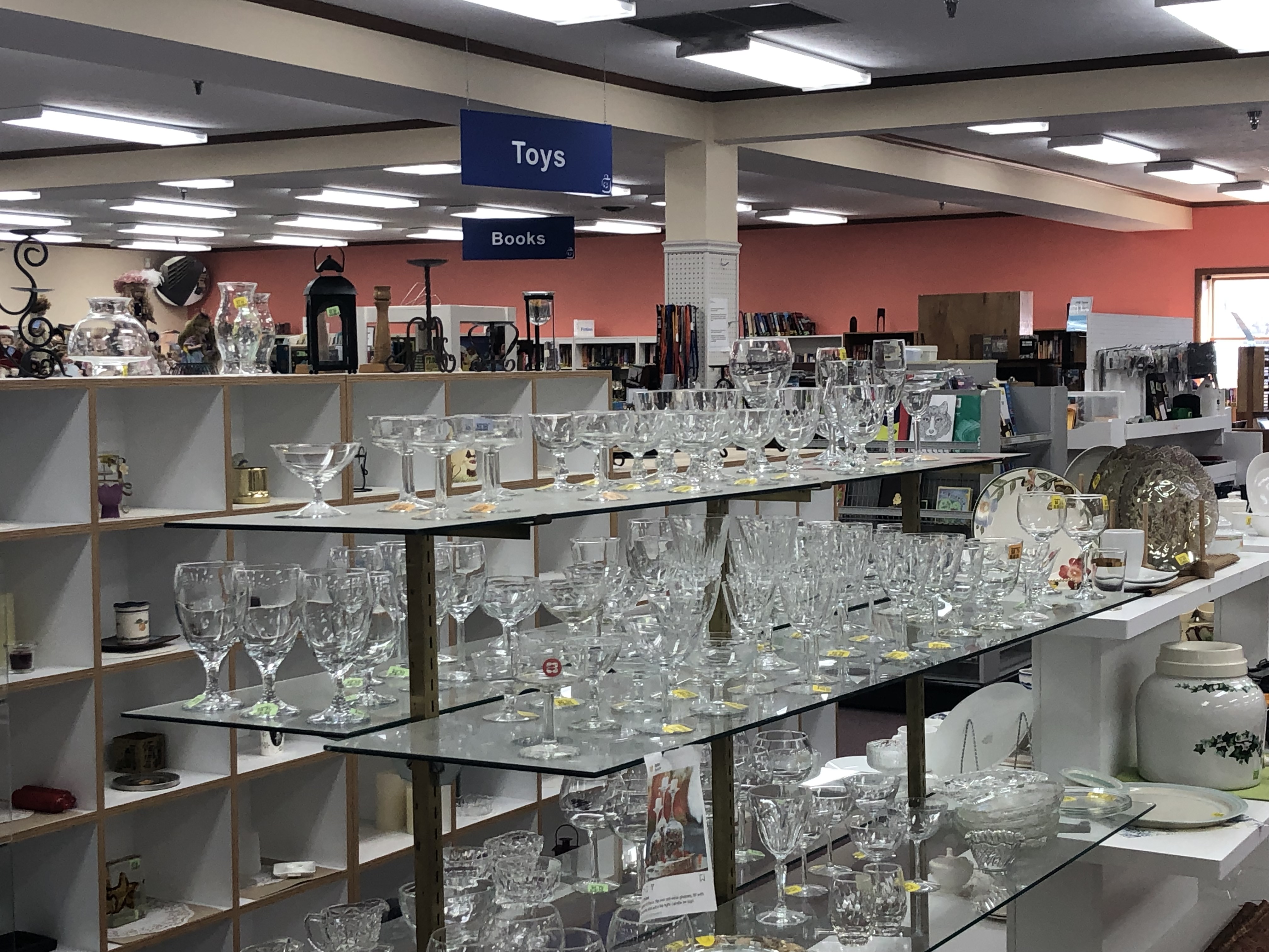 The glassware section of The Depot Thrift Shop.