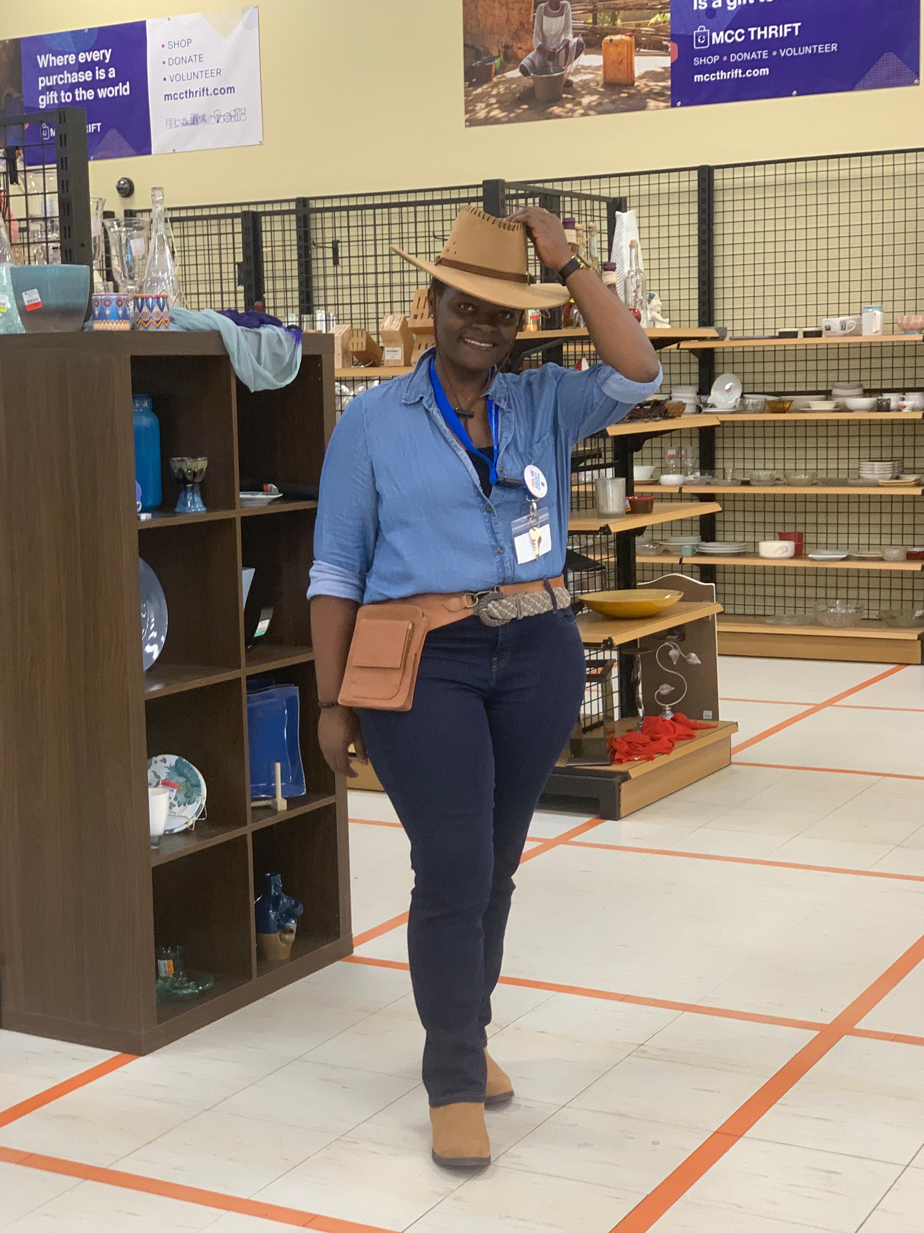 Frances with a blue shirt and hat