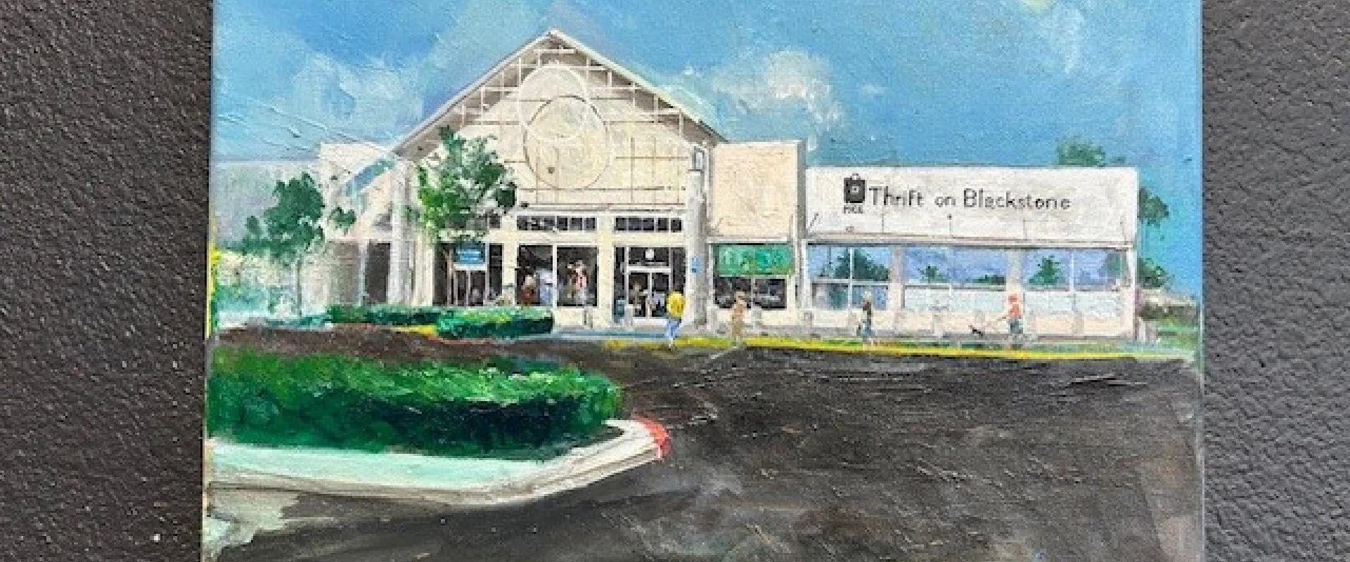 A painting of the Thrift on Blackstone storefront.