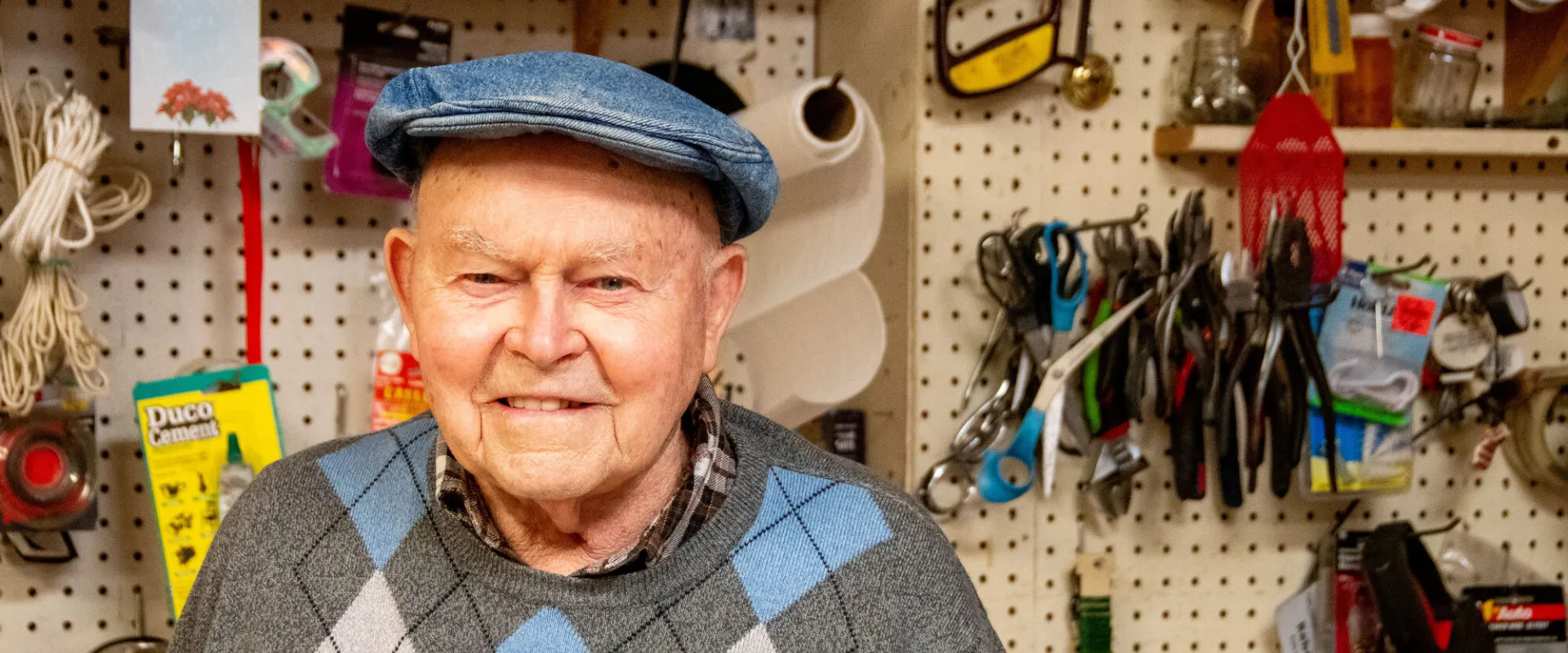 Nelson Hershey, longtime volunteer and founder of Columbia Re-Uzit Shop, sits in his favorite chair in the donation receiving area in the back of the MCC thrift shop.