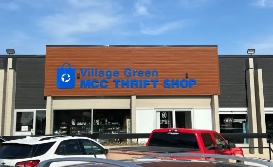 Storefront signage for thrift shop