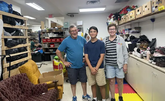 Marc, Max and Linda Little in the back of Sargent MCC Thrift Shop