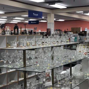 The glassware section of The Depot Thrift Shop.